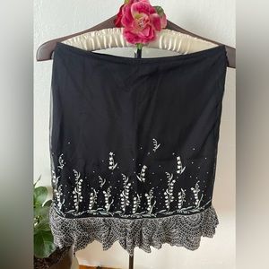 A-line black strut with green flowers and tulle very pretty